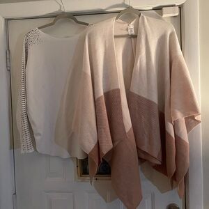 Pair of women’s sweaters